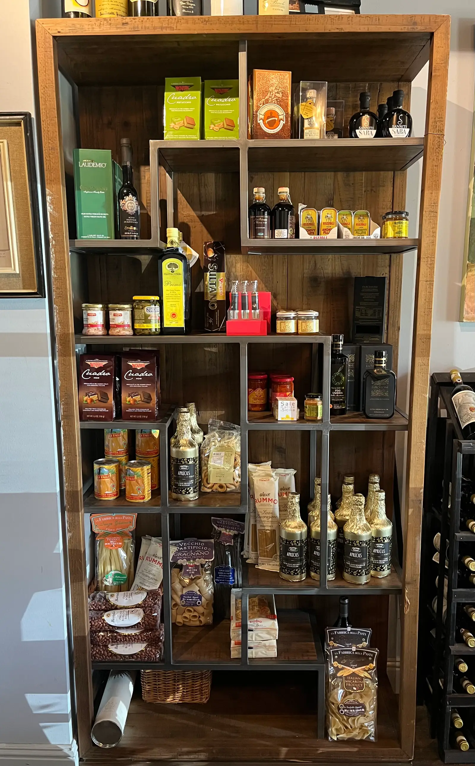Onotria boutique shelves — curated Italian pantry products, olive oils, and pasta