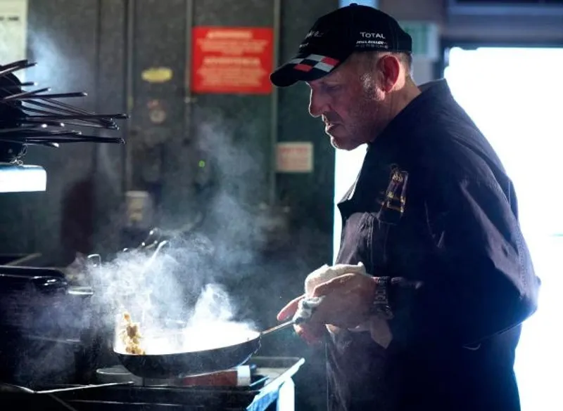 Master Chef Massimo Navarretta cooking in the kitchen